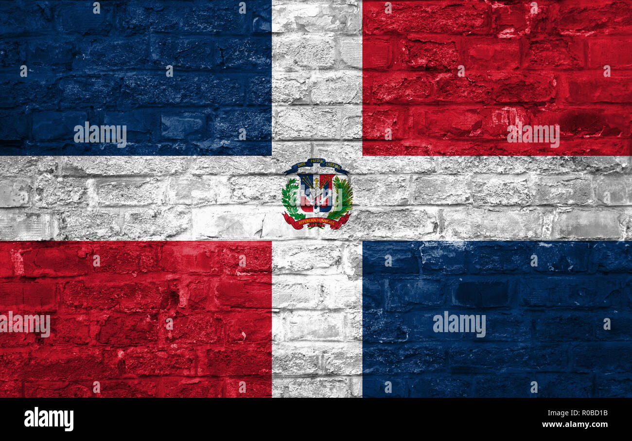 Flag of Dominican Republic over an old brick wall background, surface Stock Photo