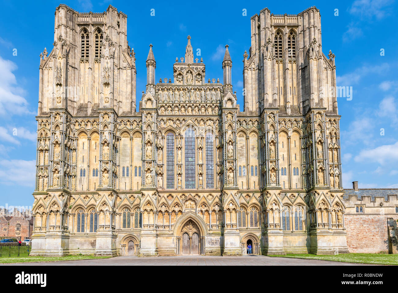 The impressive Wells Cathedral is bathed in May sunshine. Stock Photo