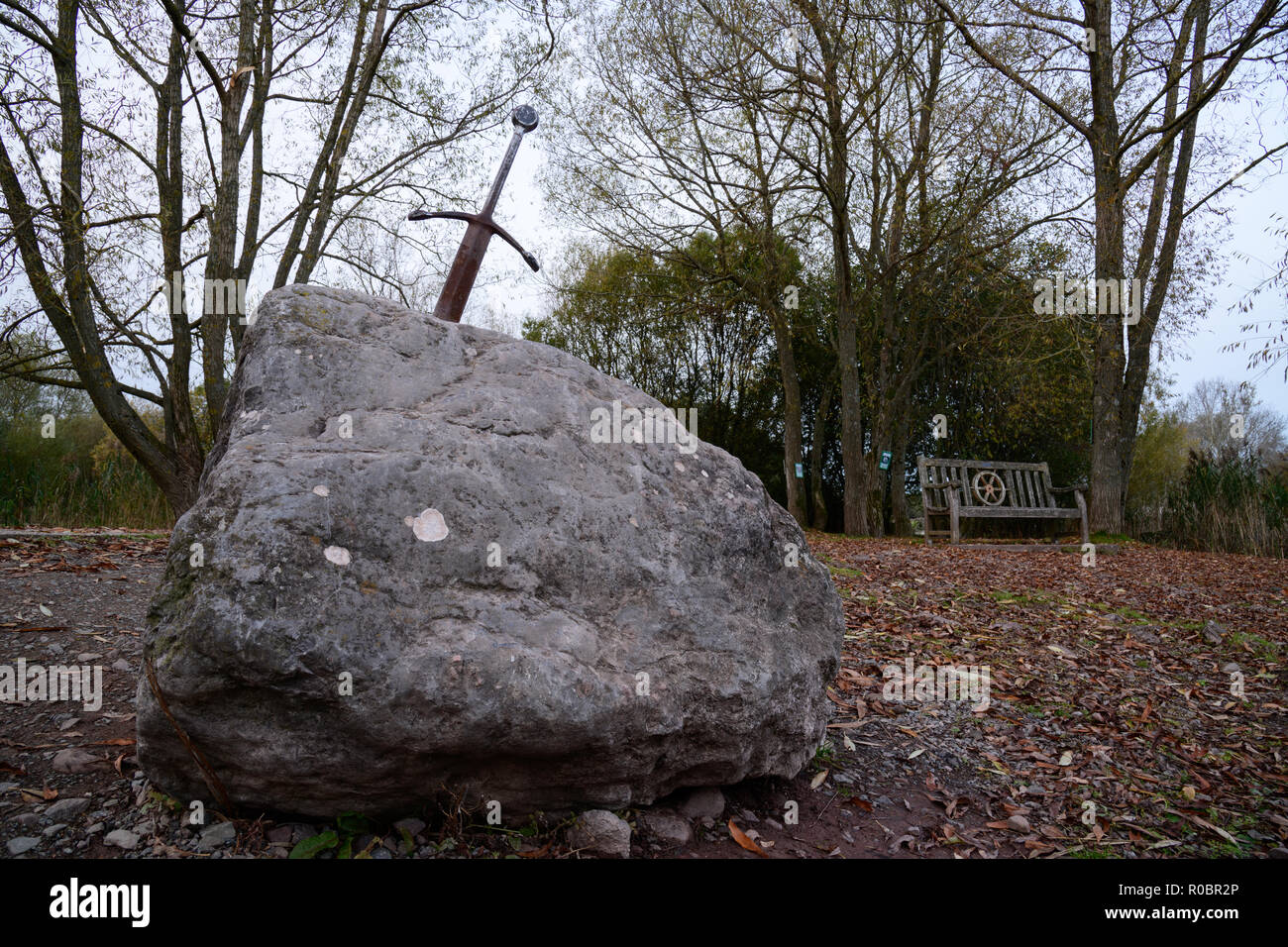 Excalibur the famous sword in the stone of king Arthur in the forest ...