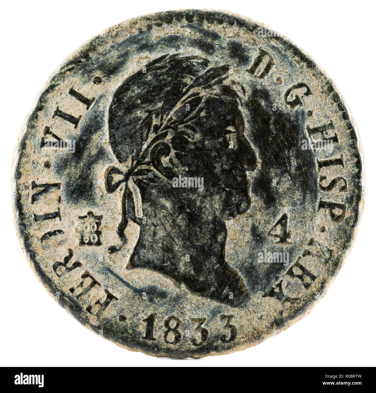 Ancient Spanish copper coin of the King Fernando VII. 1833. Coined in Segovia. 4 Maravedis. Obverse. Stock Photo