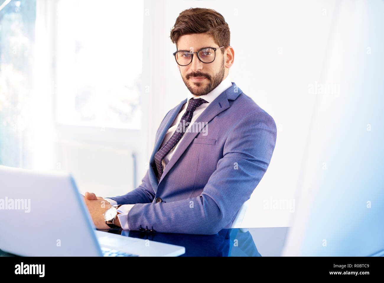 Portrait Of Executive Financial Advisor Businessman Wearing Suit