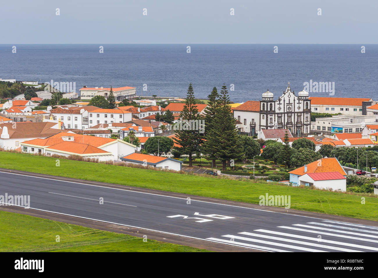 View of Santa Cruz Das Flores city and airport Flores Island and Corvo island in the background, Azores Stock Photo