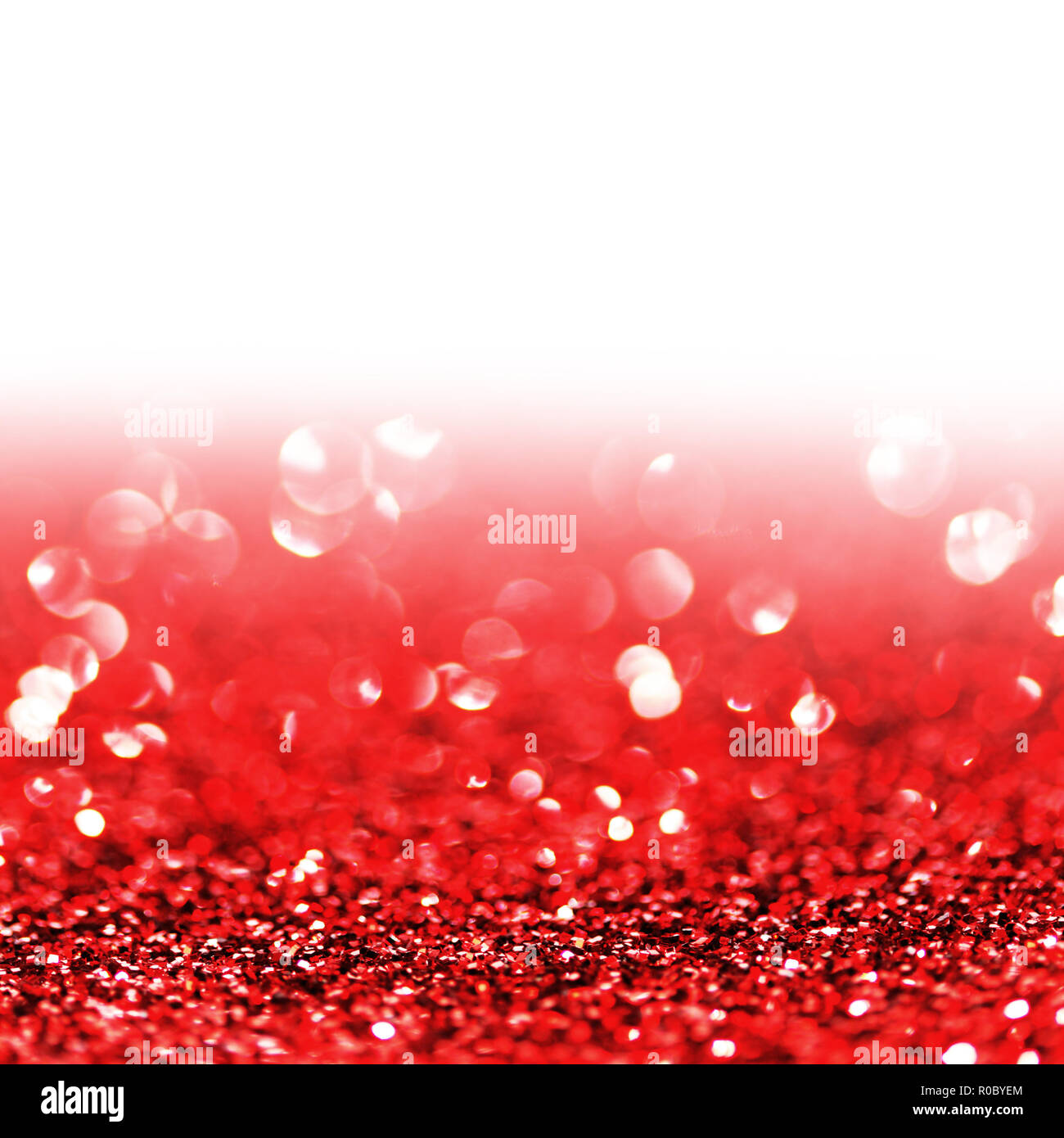 Red twinkling lights abstract holiday background with white copy space Stock Photo