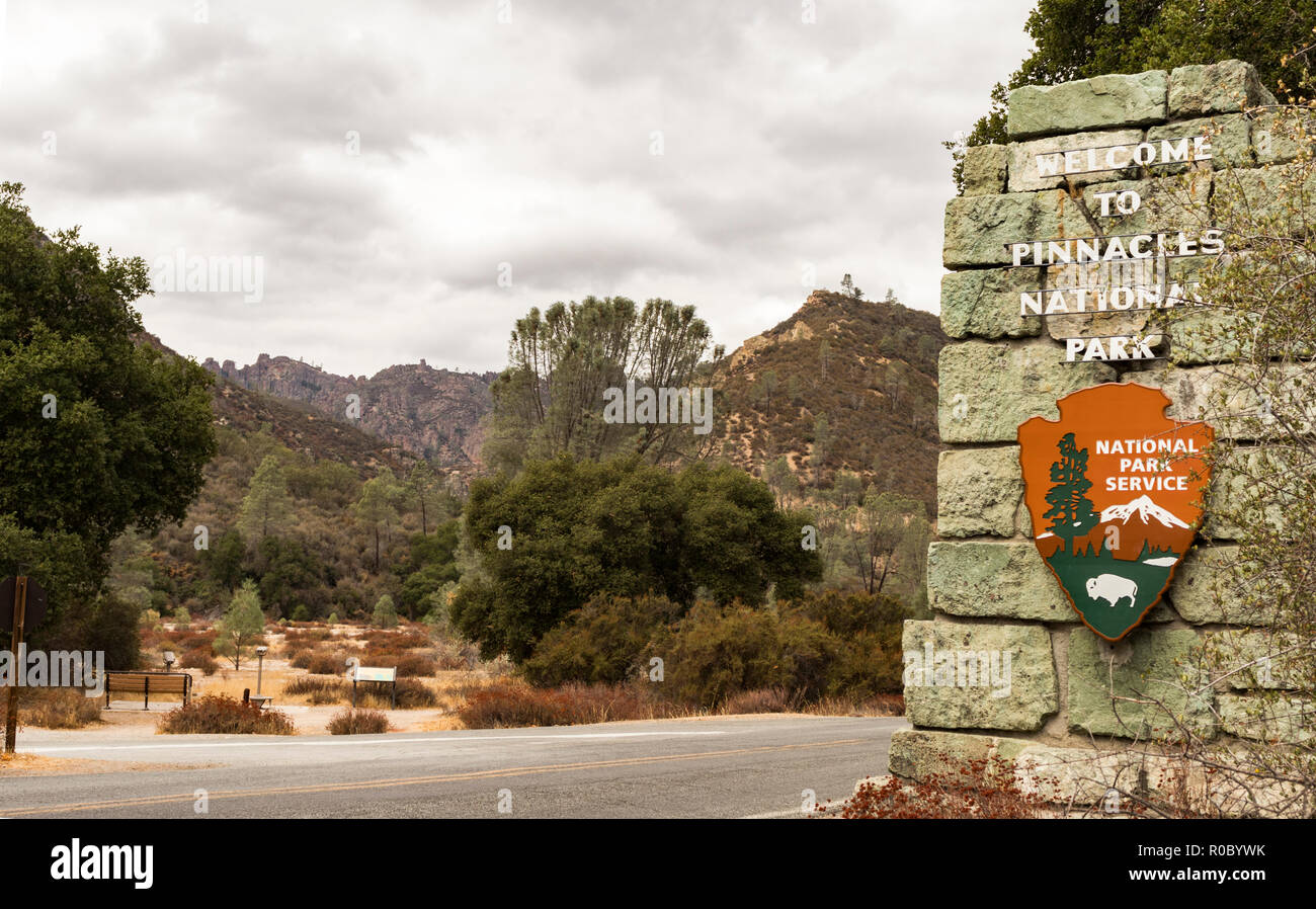 Entrance with NPS sign and a view of High Peaks at Pinnacles National Park, California, USA. Stock Photo