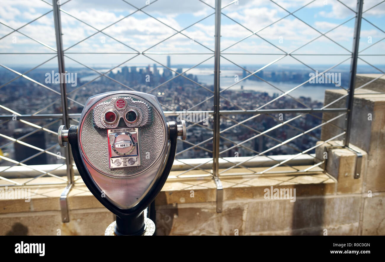 Tourist coin operated binoculars at the top of the Empire State Building in New York City, USA
