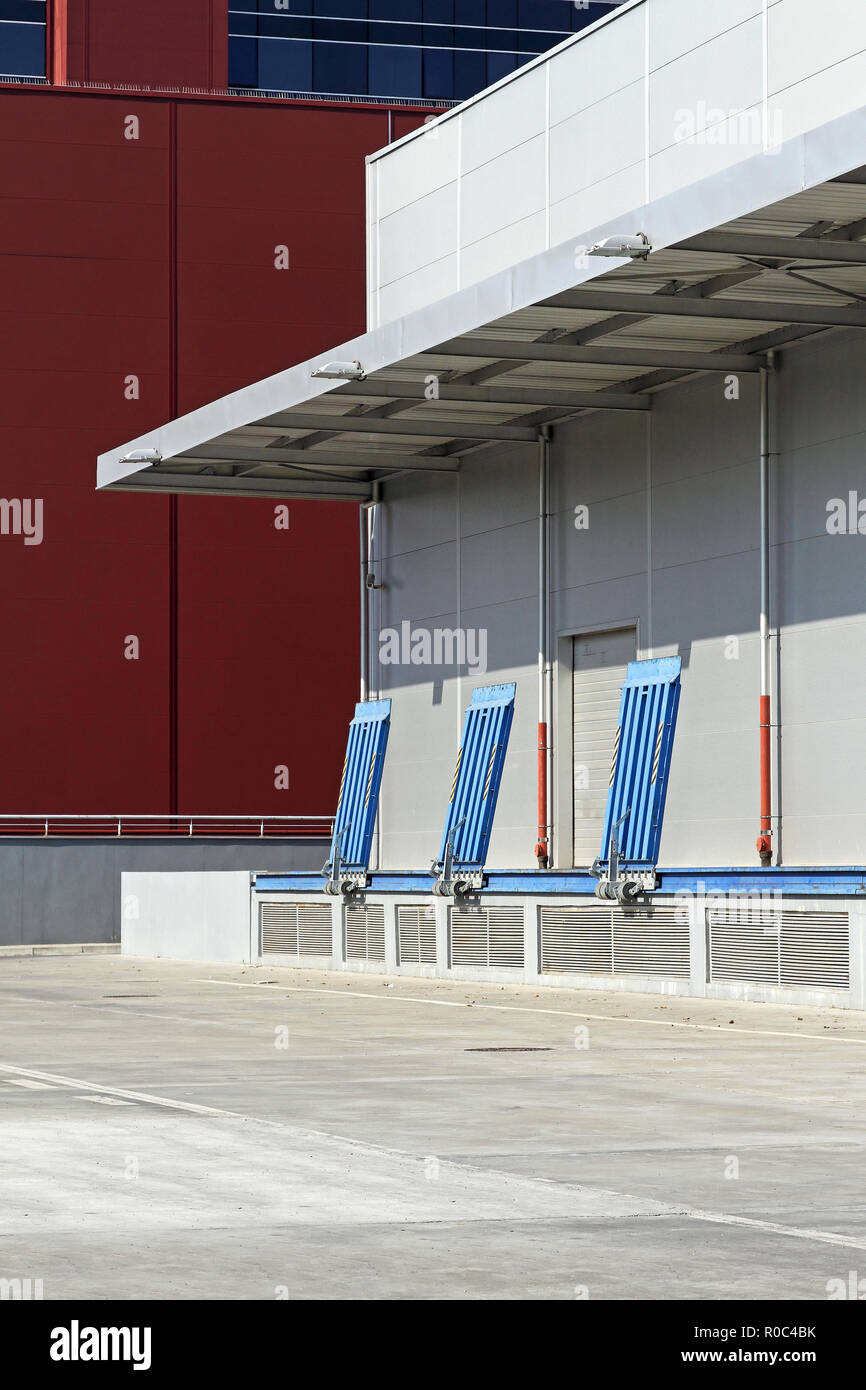 Exterior of industrial warehouse building with loading bay Stock Photo