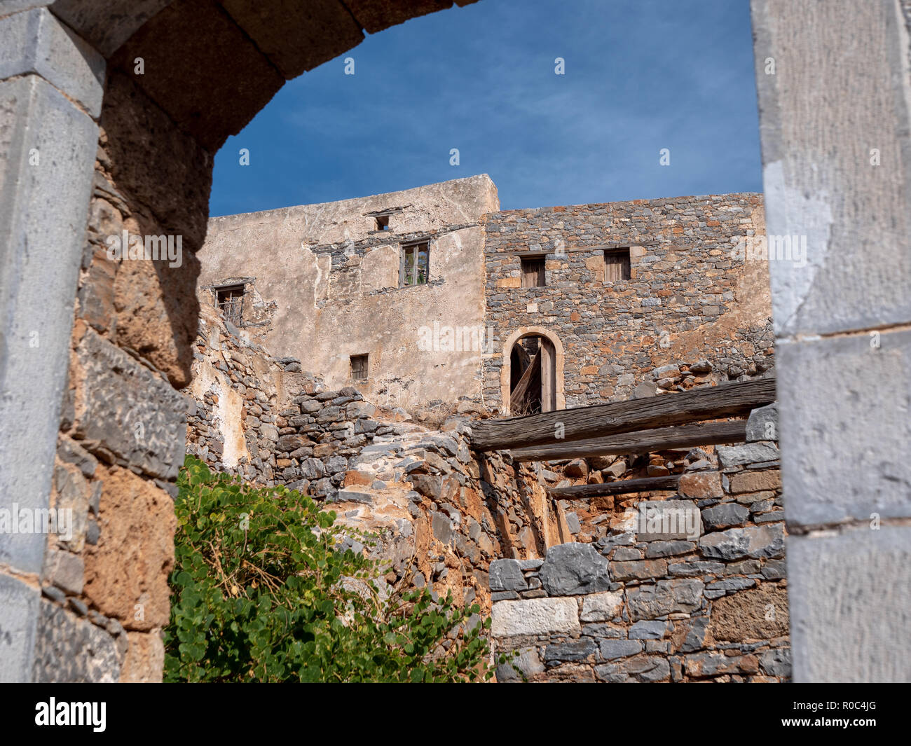 Abandoned buildings on Spinalonga Island, the historical abandoned ...