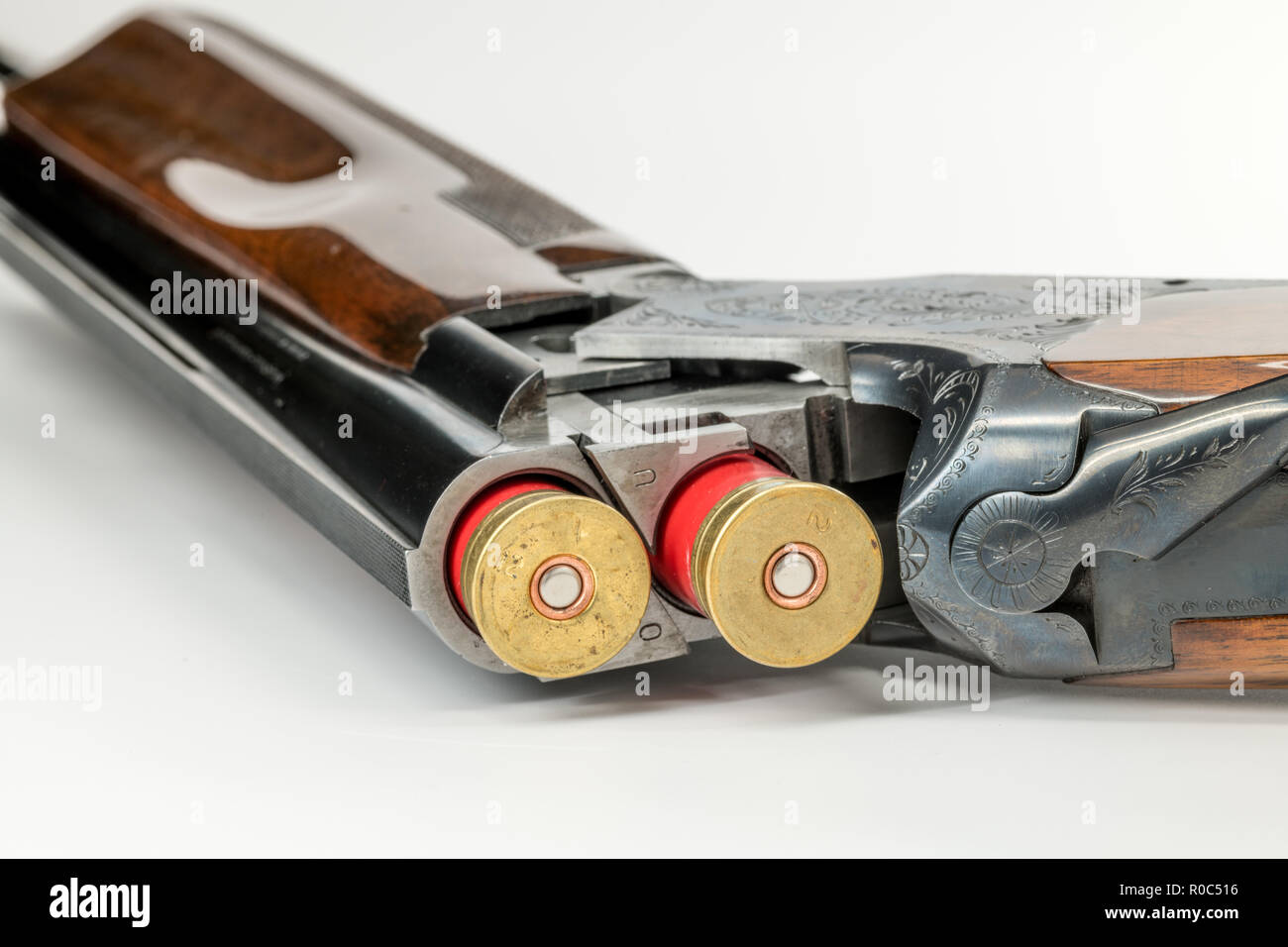 Classic shotgun with plastic bullets in the barrel ready to shoot Stock Photo