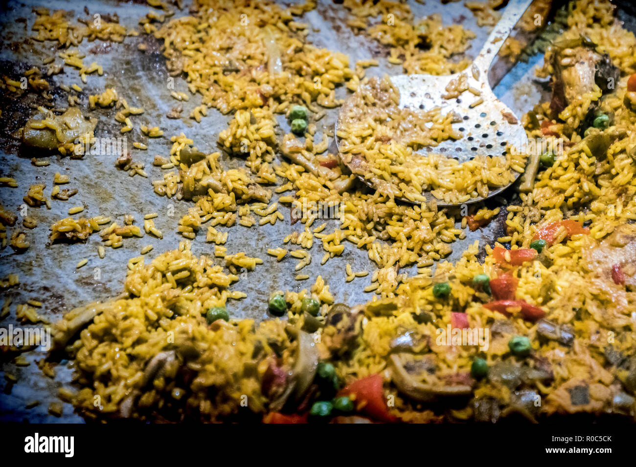 Remnants of Spanish Paella in a wok, conceptual image Stock Photo