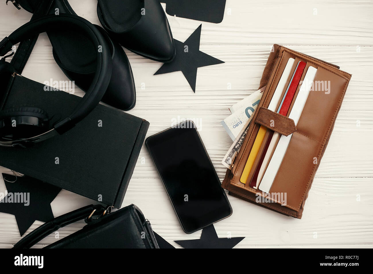 Wallet with credit cards and money, phone, black bag, gift box, price