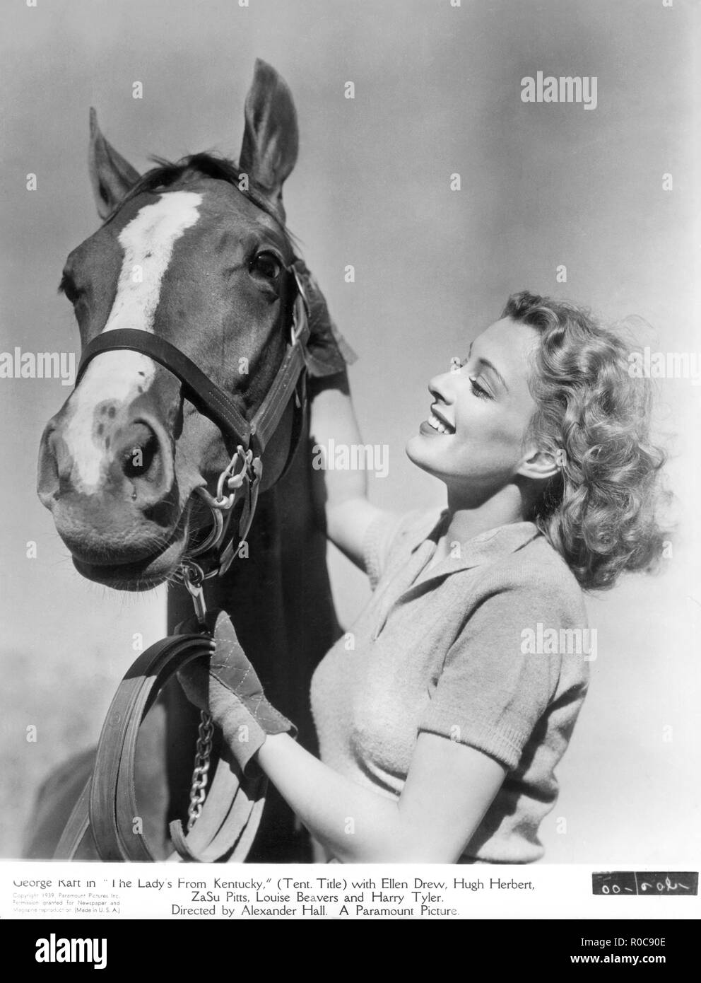 Actress Ellen Drew, Publicity Portrait with Horse for the film, 'The Lady's from Kentucky', Paramount Pictures, 1939 Stock Photo