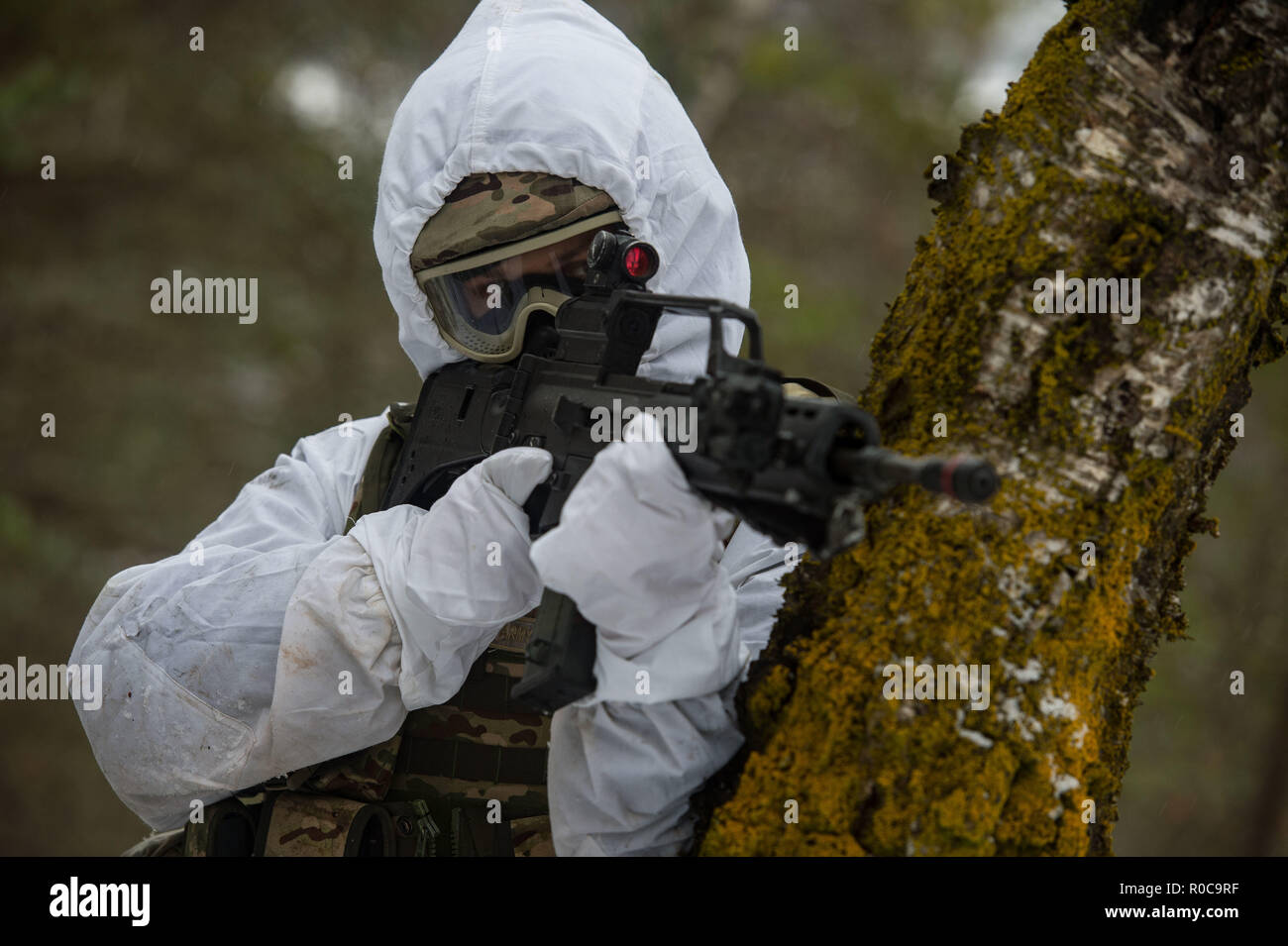 A soldier, from the 1st Infantry Company of the Armed Forces of Montenegro, holds a defensive position during Exercise TRIDENT JUNCTURE 2018 in Folldal, Norway, on November 2nd 2018.    Trident Juncture 2018 is NATO’s largest exercise in many years, bringing together around 50,000 personnel from all 29 Allies, plus partners Finland and Sweden. Around 65 vessels, 250 aircraft and 10,000 vehicles will participate.    Photo: Sgt Marc-André Gaudreault, JFC Brunssum Imagery Stock Photo