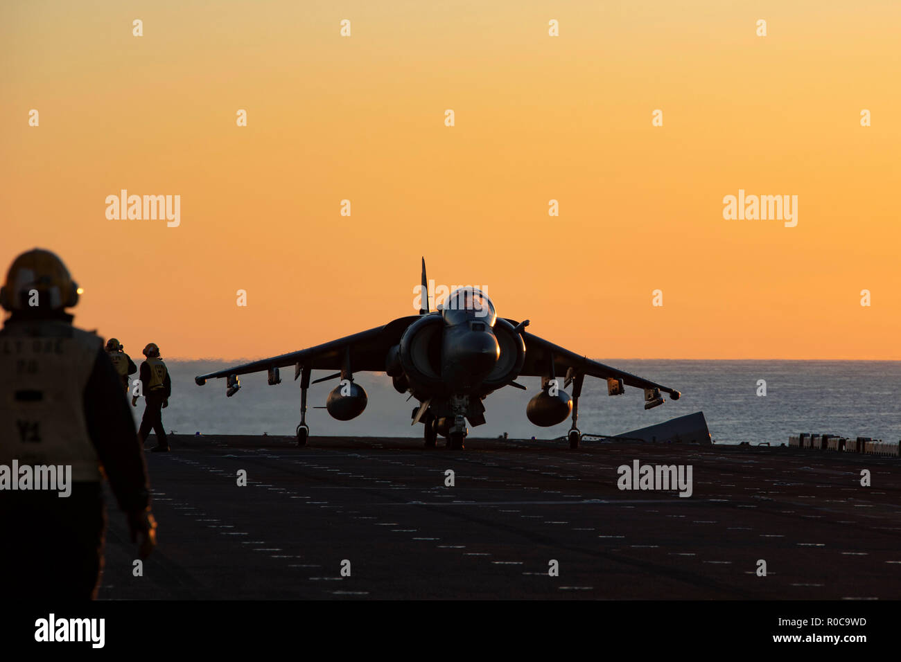 181031-N-WH681-0101 ATLANTIC OCEAN (Oct. 31, 2018) An AV-8B Harrier prepares to take off from the flight deck of the Wasp-class amphibious assault ship USS Kearsarge (LHD 3) as part of an amphibious assault exercise during the Carrier Strike Group (CSG) 4 composite training unit exercise (COMPTUEX). COMPTUEX is the final pre-deployment exercise that certifies the combined Kearsarge Amphibious Ready Group's and 22nd Marine Expeditionary Unit's abilities to conduct military operations at sea and project power ashore through joint planning and execution of challenging and realistic training scena Stock Photo