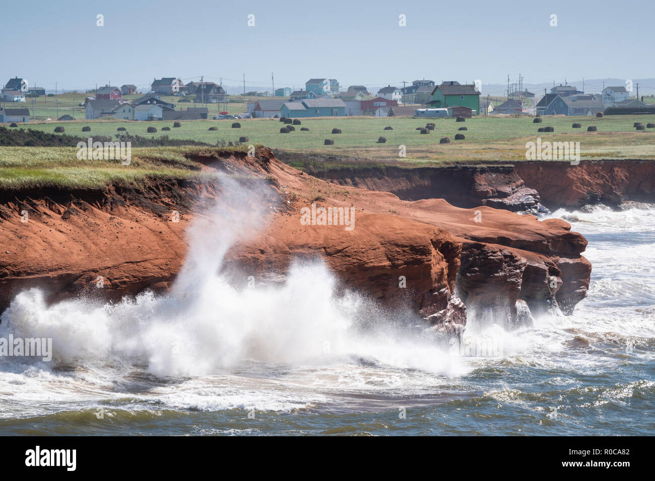 Surf pounds the sandstone cliffs of the north shore of Grindstone