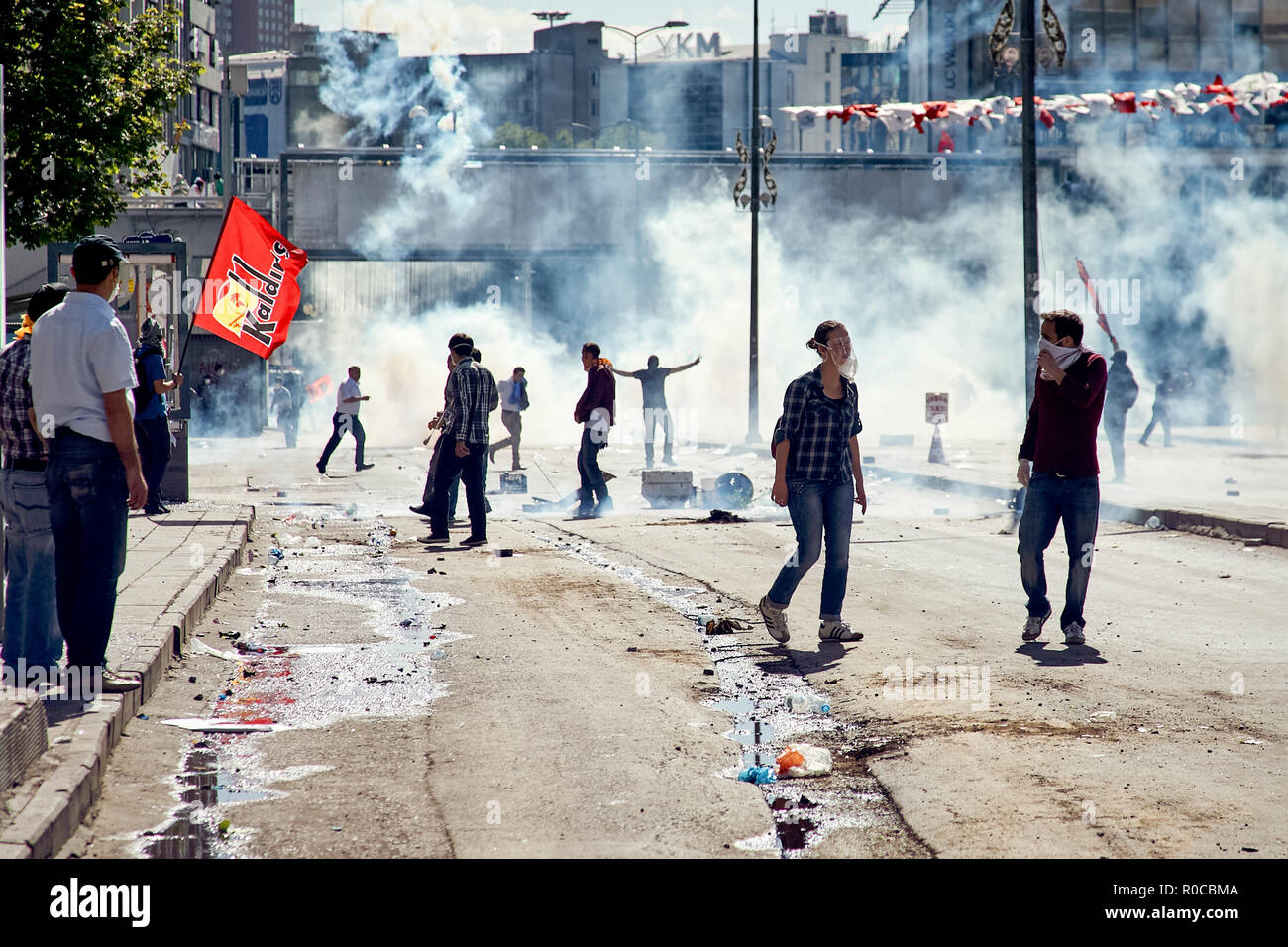 Protesters struggling against the tear gas fired by the police during Gezi park protests in Ankara, Turkey Stock Photo