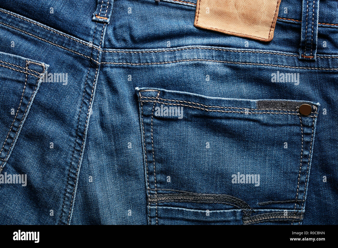 Back of an indigo color blue jean and its pocket. Close up. Stock Photo