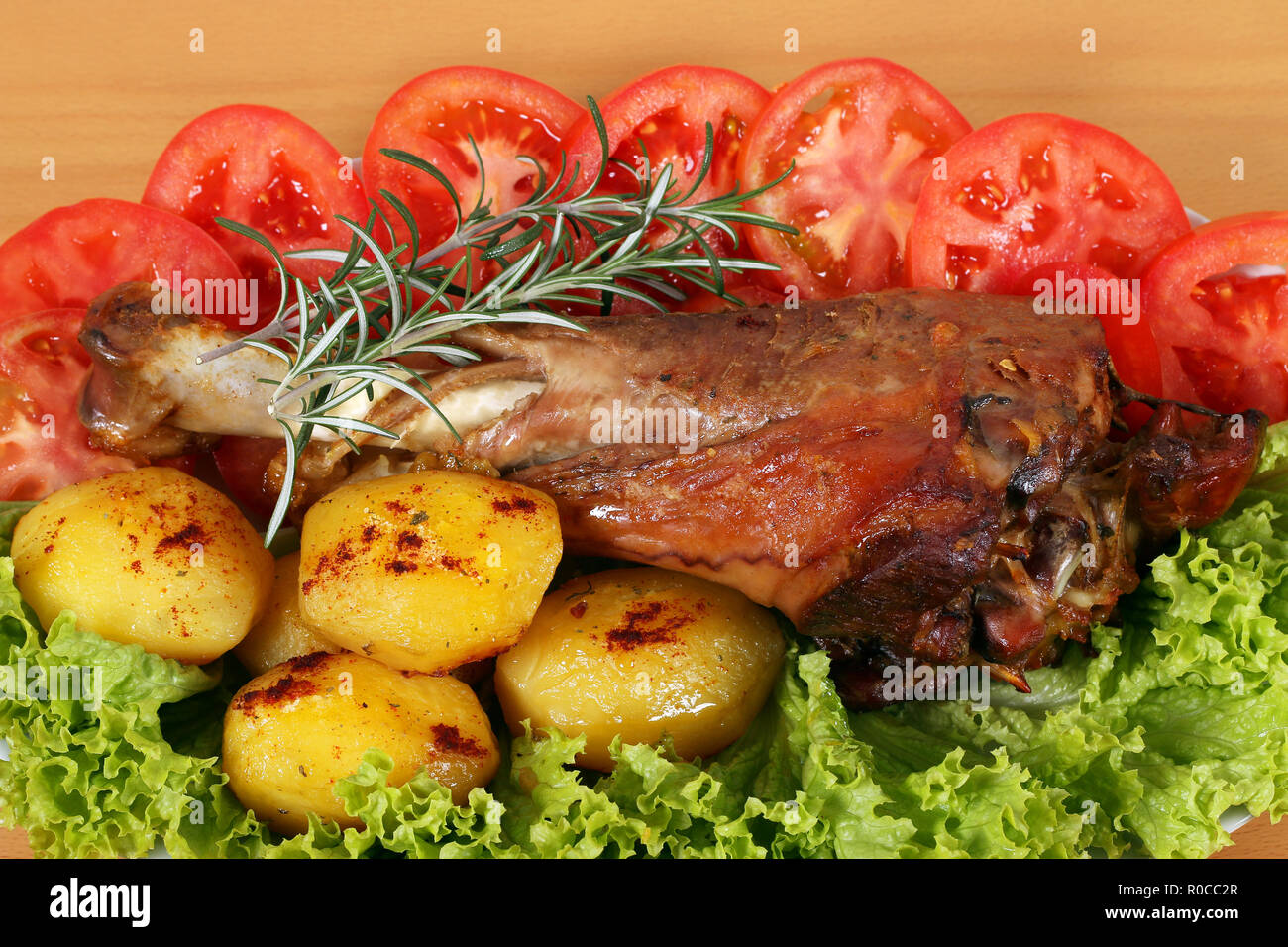 big turkey drumstick with potatoes and salad for thanksgiving day Stock Photo