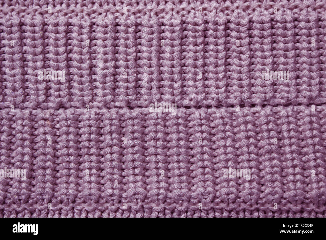 Pink knitting wool texture background. Stock Photo