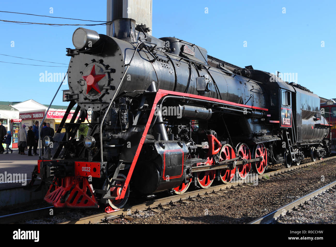 Russian retro steam locomotive series L with symbol of former state the USSR and red wheels. Part of a retro train Stock Photo