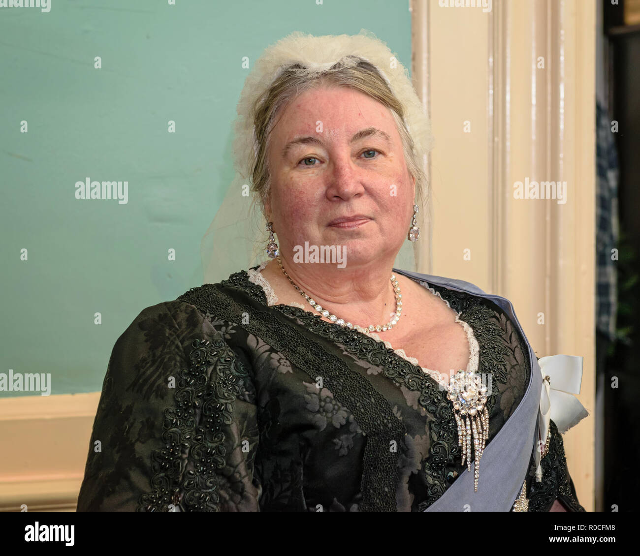 UK, Market Bosworth, Victorian Christmas Fair December 2015Reenactor poses dressed as Queen