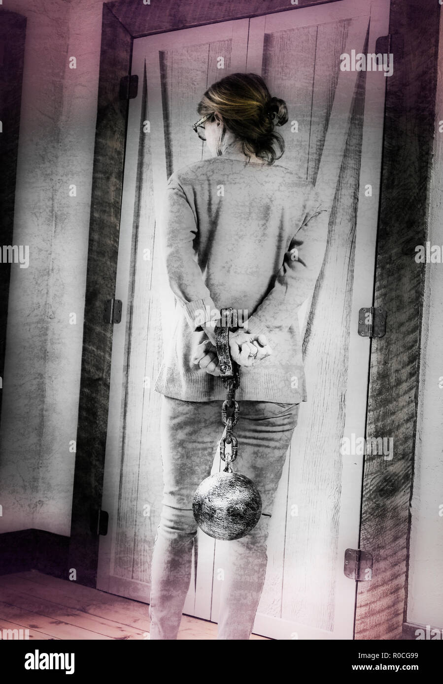 Woman chains trapped hi-res stock photography and images - Alamy