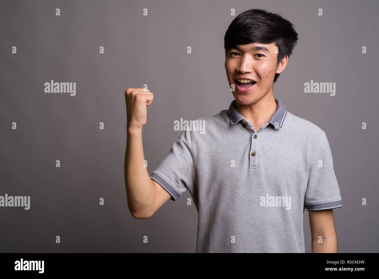 Excited young asian man hi-res stock photography and images - Alamy