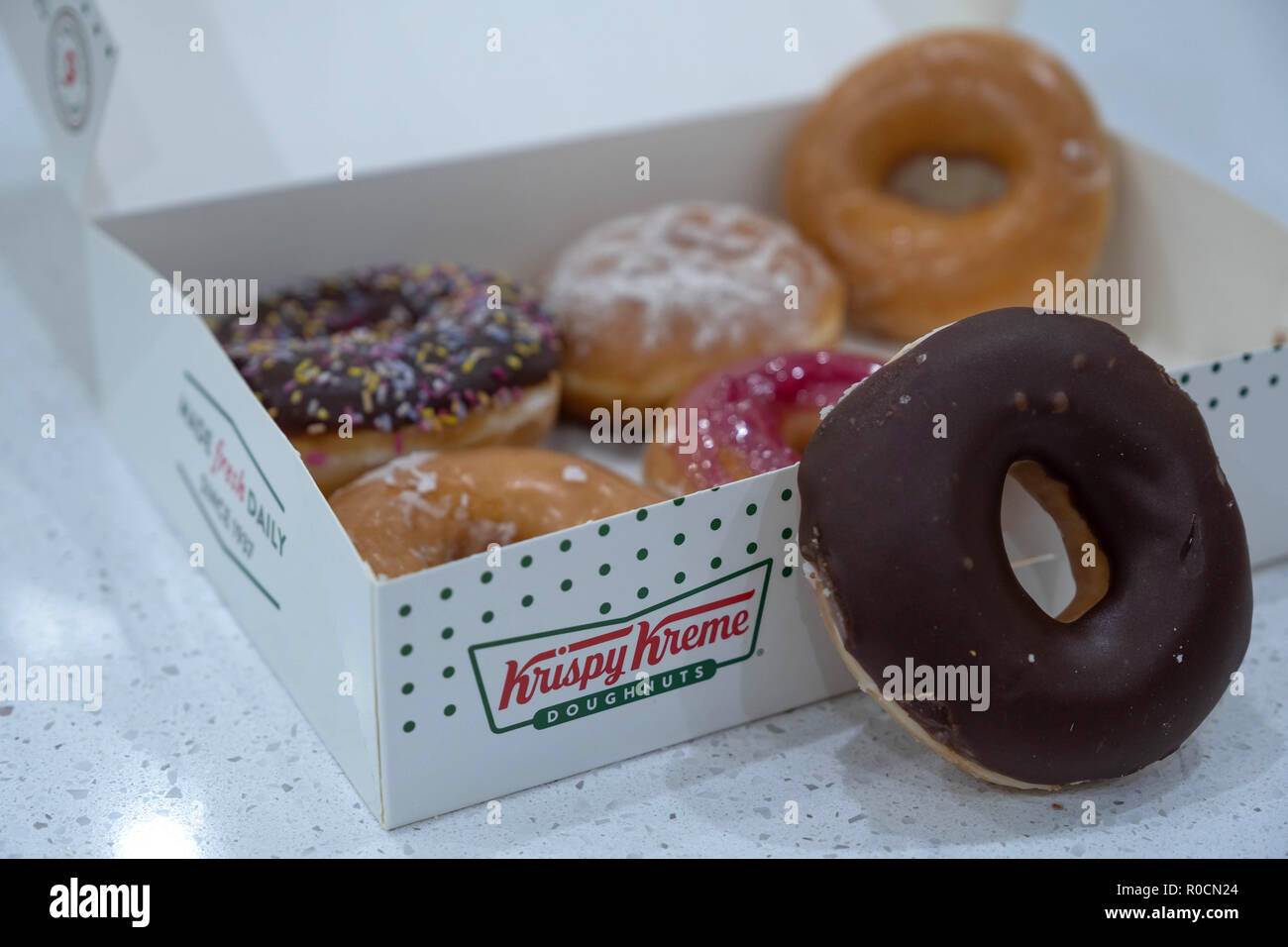 Krispy Kreme doughnuts in a box Stock Photo Alamy