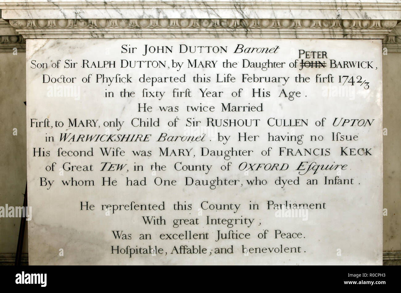 The corrected error on the tomb of Sir John Dutton, Sherborne. Baronet. St Mary Magdalene church, next to Sherborne House. Stock Photo