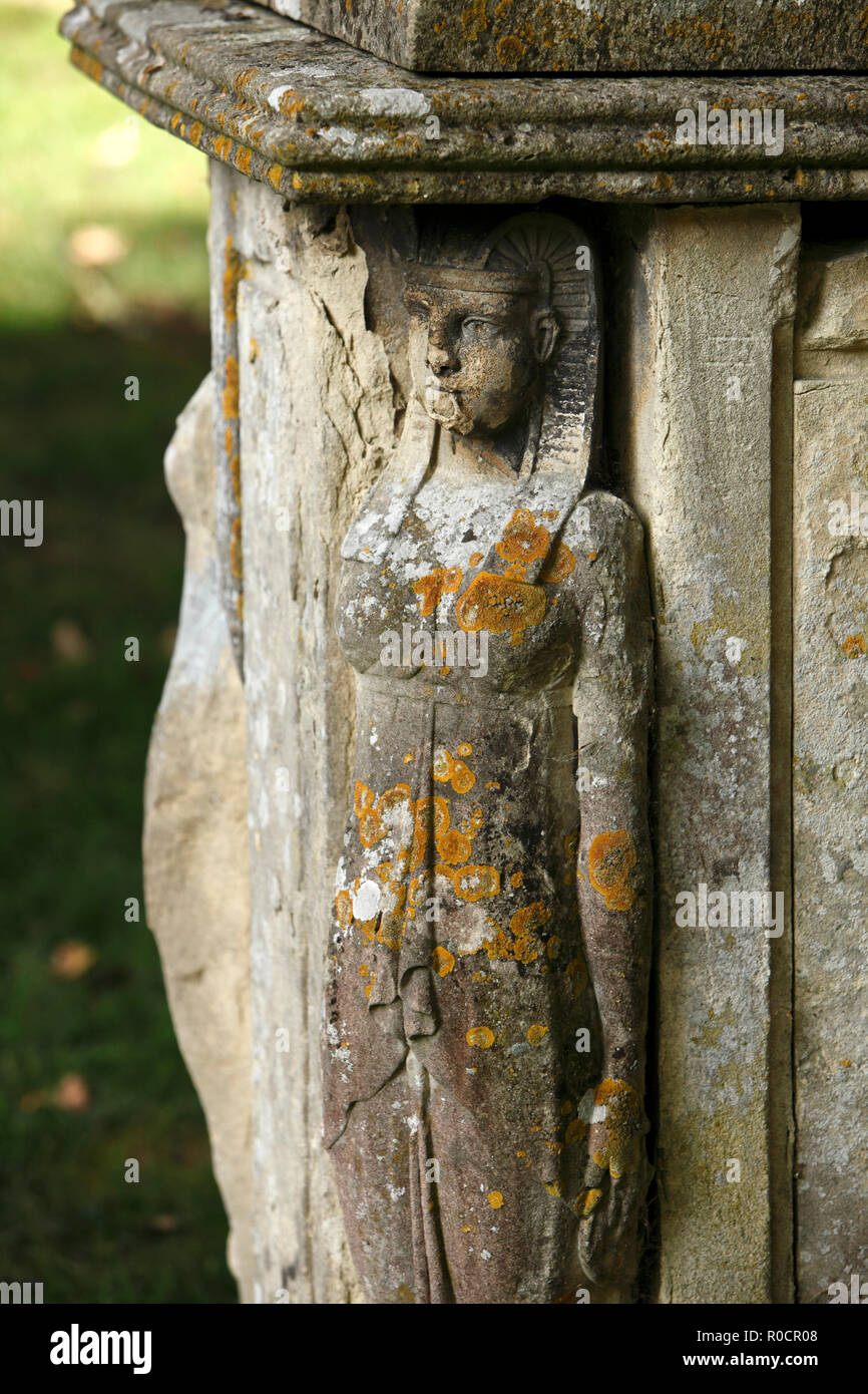 Sphinx as a corner edge on a tomb in the graveyard of Fairford St Marys church exterior stonemasons work. Stock Photo