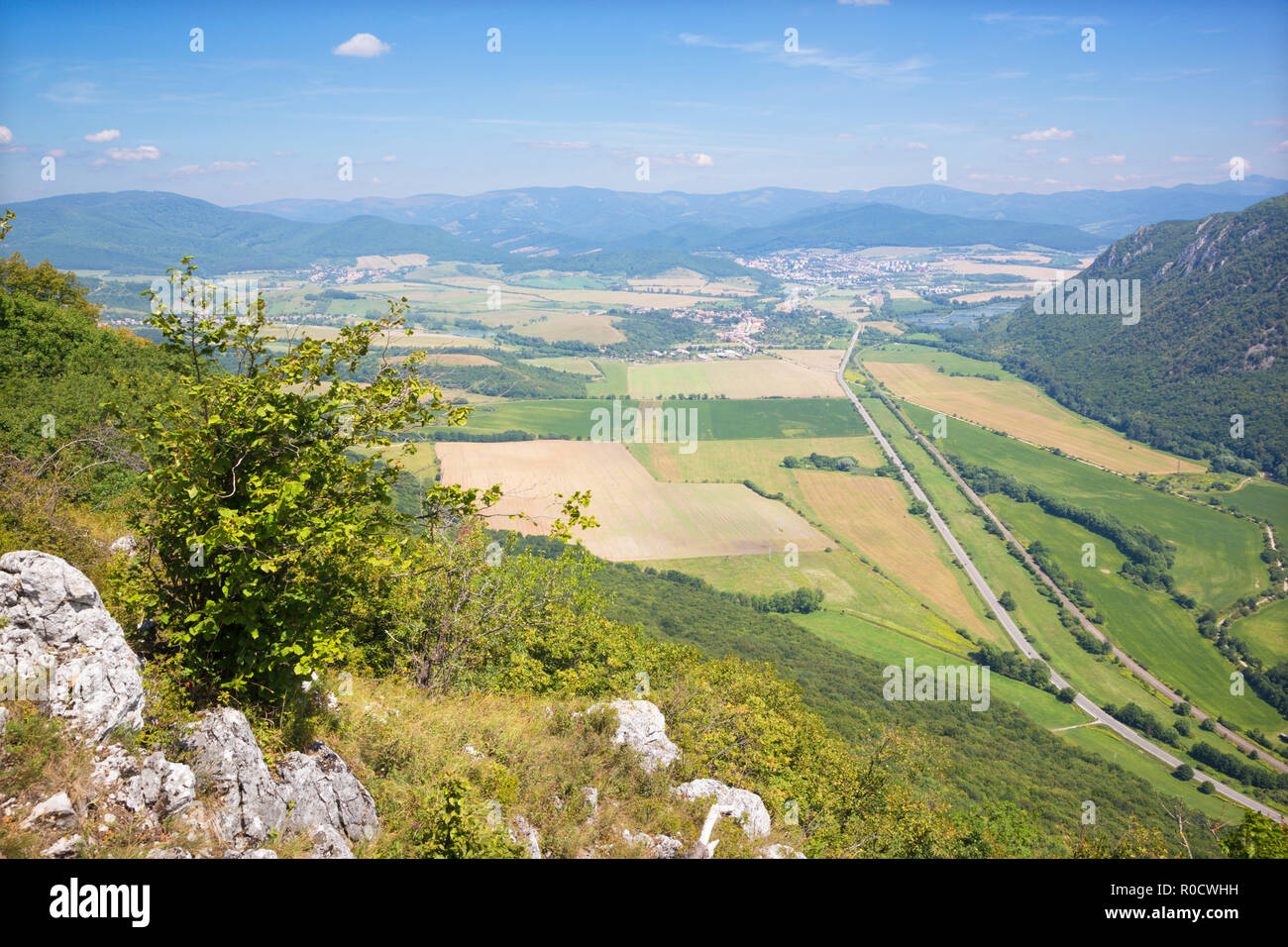 Slovakia - The view from Plesivecka planina plateau in national park Slovensky Kras to Roznava and Volovske vrchy mountains. Stock Photo