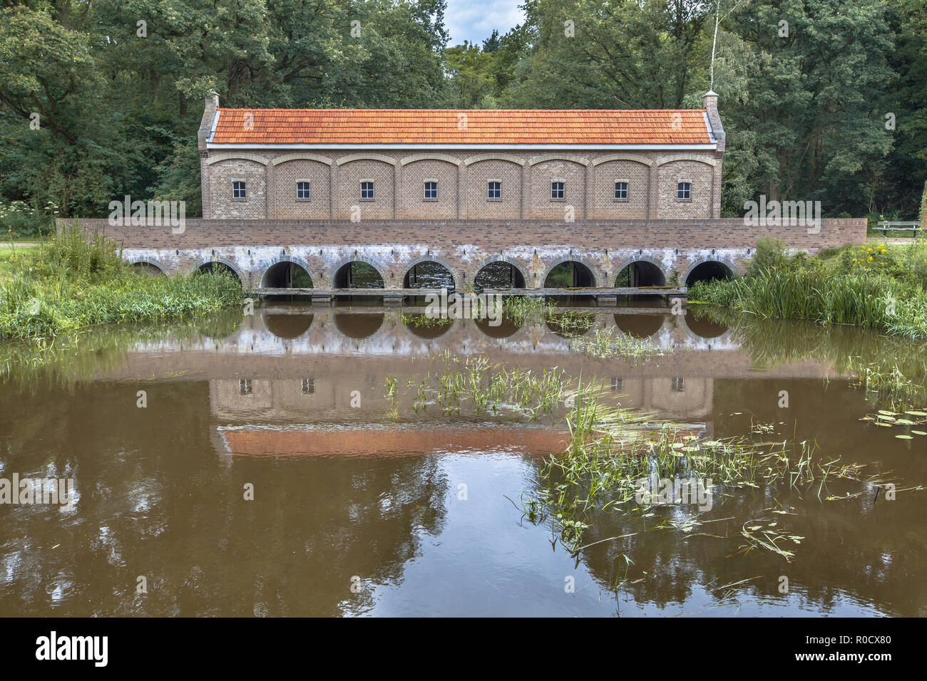 Famous Sluice house or schuivenhuisje at Almelo Nordhorn Canal in Twente Stock Photo