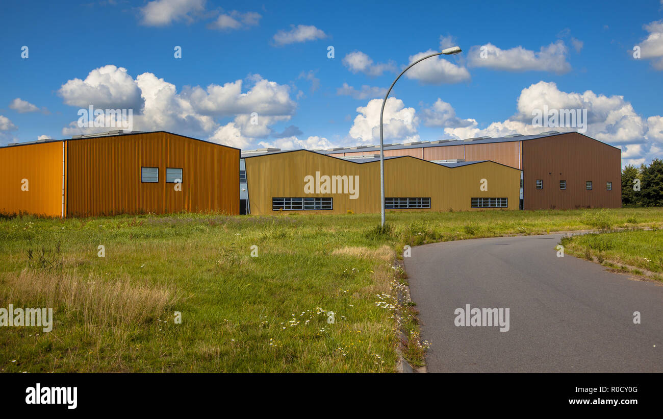 Vacant place in a commercial industrial area under development on a sunny day Stock Photo