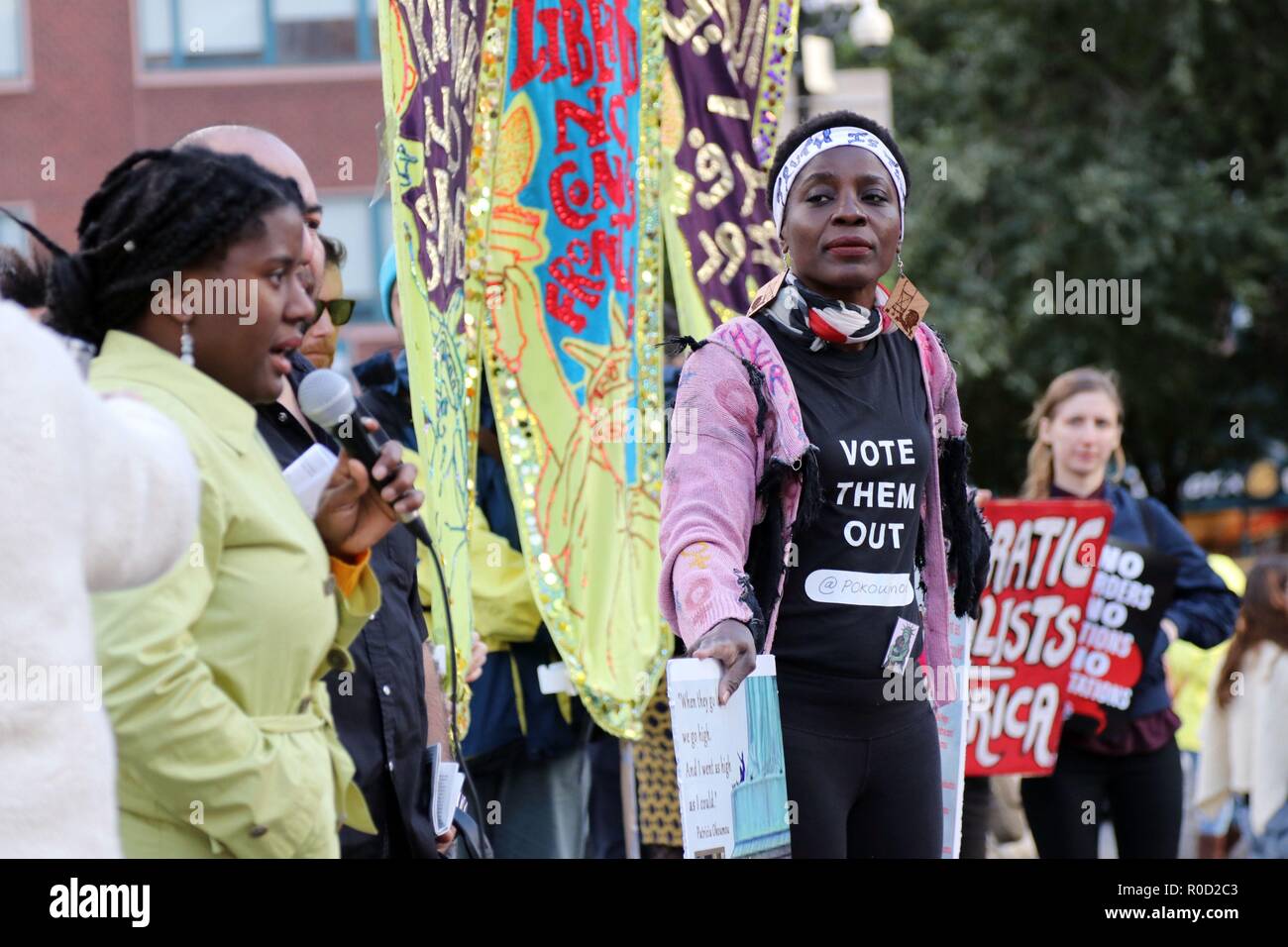 New York City, New York, USA. 3rd Nov, 2018. Statue Of Liberty climber Therese Patricia Okoumou (C) join an activist coalition consisting of twenty-eight (28) organizations rallied at Union Square on 3 November 2018, in solidarity with the Central American migrant caravan traveling toward the US southern border and against bigotry and state violence targeted at all immigrants, and refugees. Credit: G. Ronald Lopez/ZUMA Wire/Alamy Live News Stock Photo