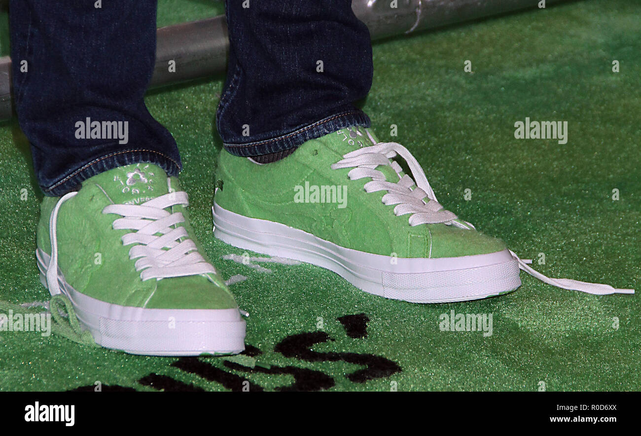 New York, NY, USA. 03rd Nov, 2018. Close up of Chris Meledandri's Converse  GOLF le FLEUR sneakers at the New York Premiere of 'Dr. Seuss' The Grinch'  at Alice Tully Hall, Lincoln