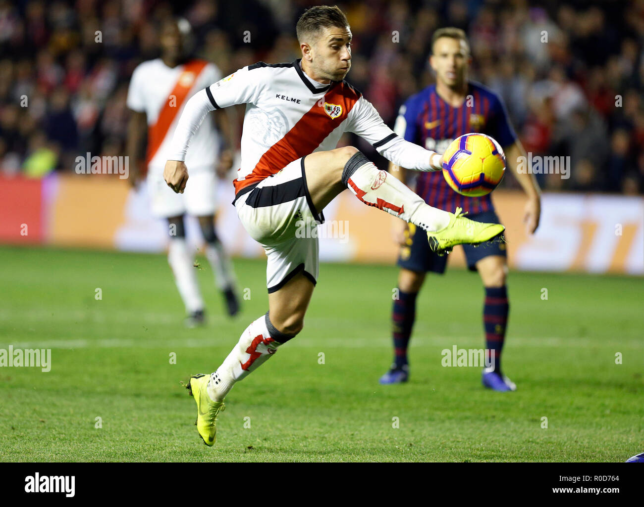 Pozo (Rayo Vallecano) in action during the La Liga match between Rayo Vallecano and FC Barcelona at Estadio Vallecas in Madrid. (Final Score Rayo Vallecano 2 - 3 FC Barcelona) Stock Photo