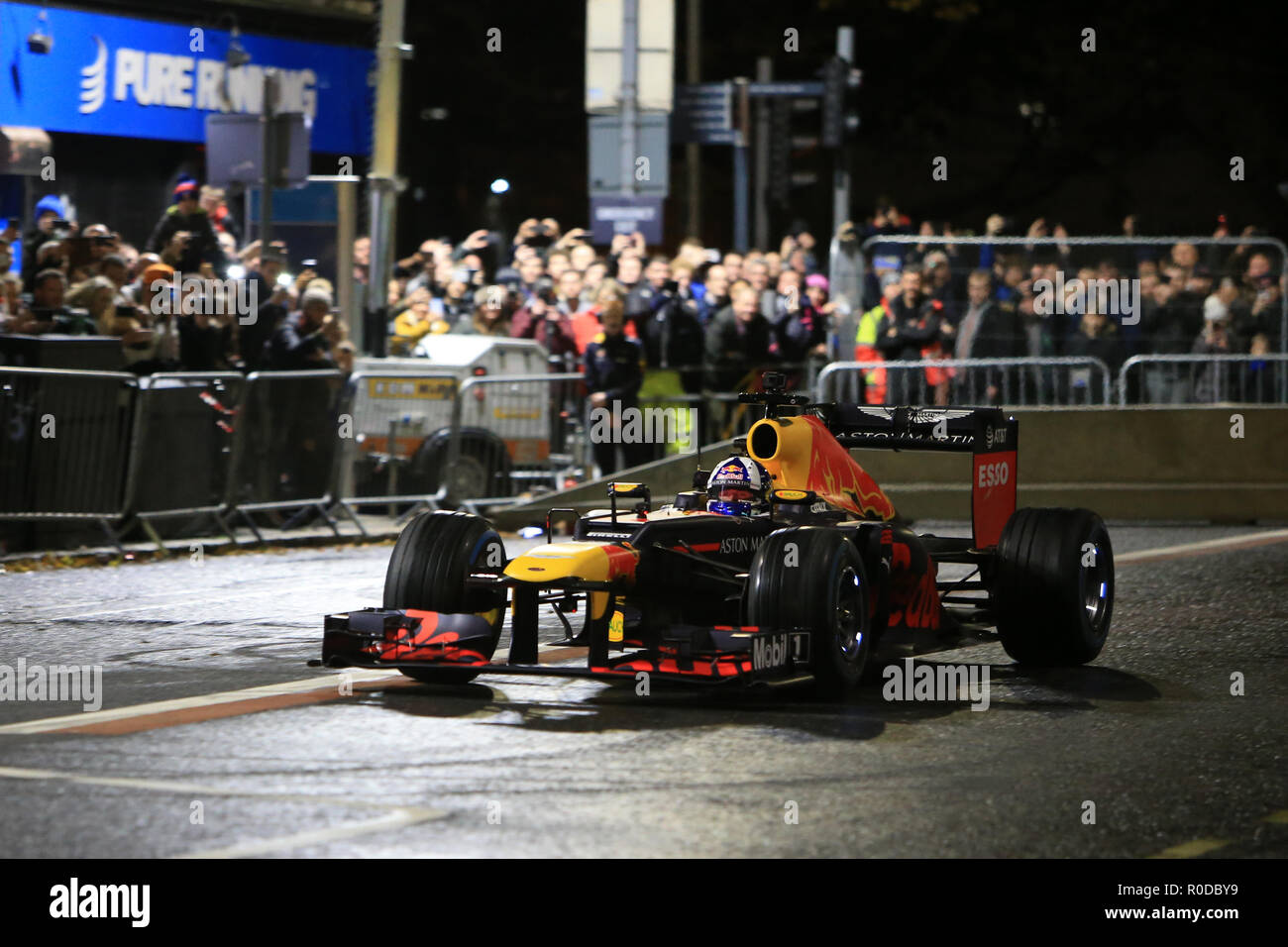 Belfast, Northern Ireland, UK. 3rd November, 2018. Highlights from Redbull F1 Showrun Belfast. Racing legend David Coulthard brought the adrenaline pumping roar of his engine to the streets of Belfast Saturday 3rd of November, 2018. A show like no other, as the Red Bull Racing Formula 1 car performs a full repertoire of donuts, burnouts and speed stretches in front of Belfast's iconic City Hall. This one-of-a-kind show was free to attend gathered thousands. Credit: Irish Eye/Alamy Live News Stock Photo