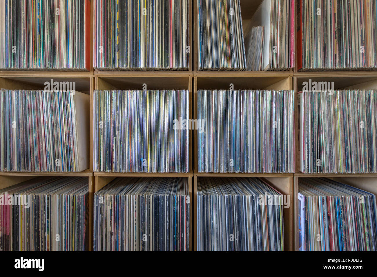 Huge record collection ordered by music style on many shelves Stock