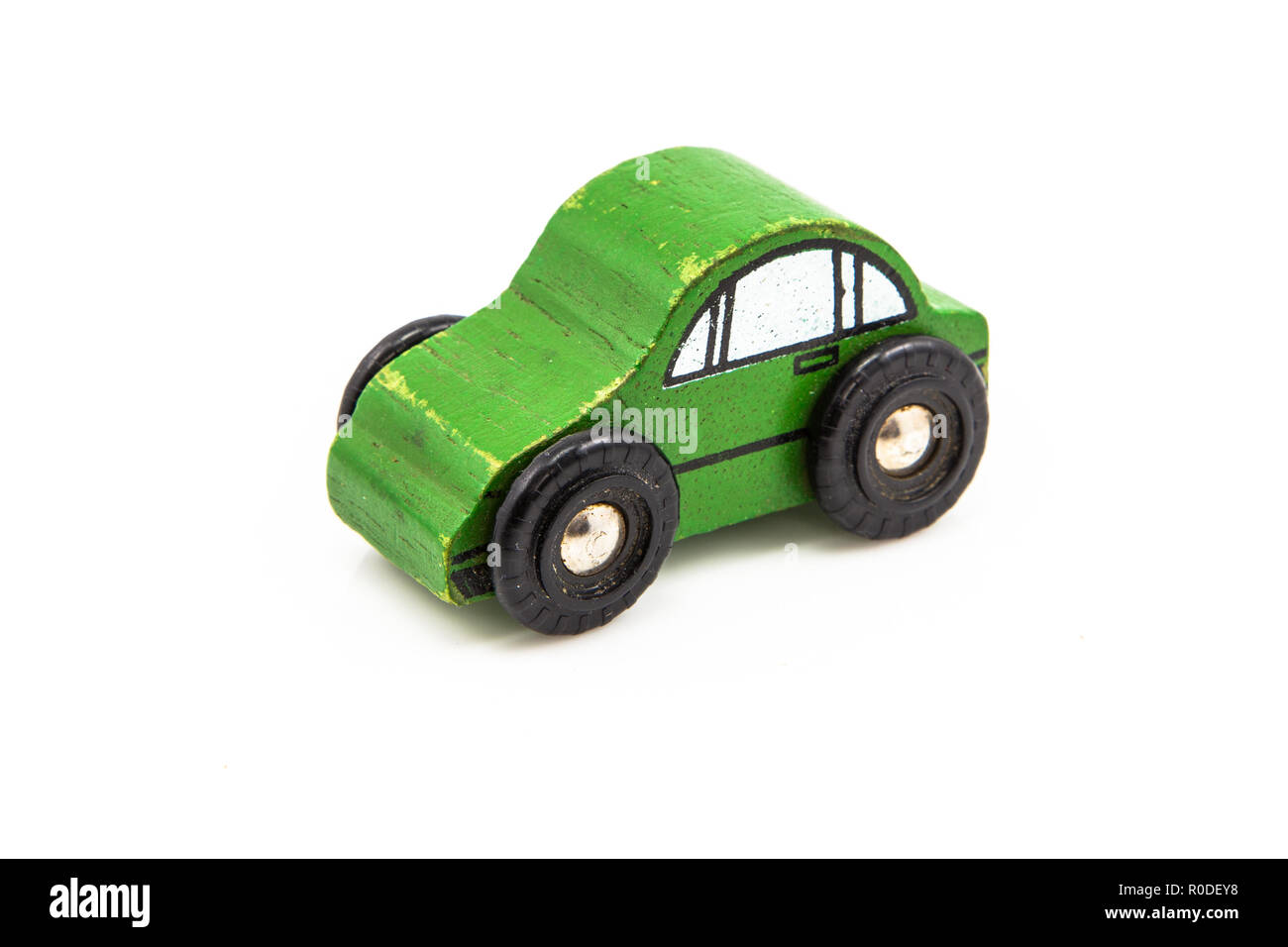 Green  Car Toy made of Wood on White Background Stock Photo