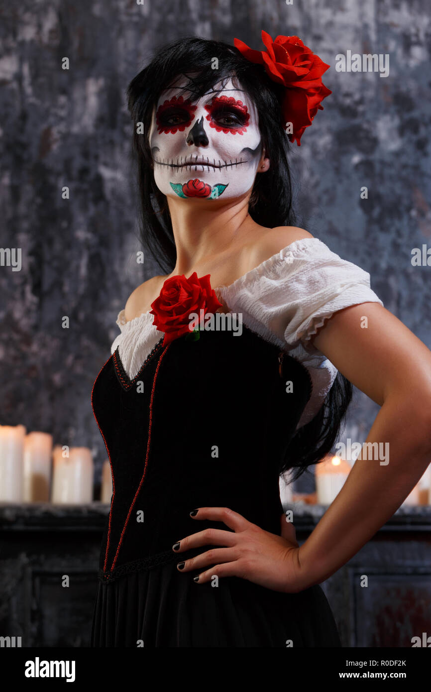 Photo of zombie girl with grim bodypainting on face Stock Photo