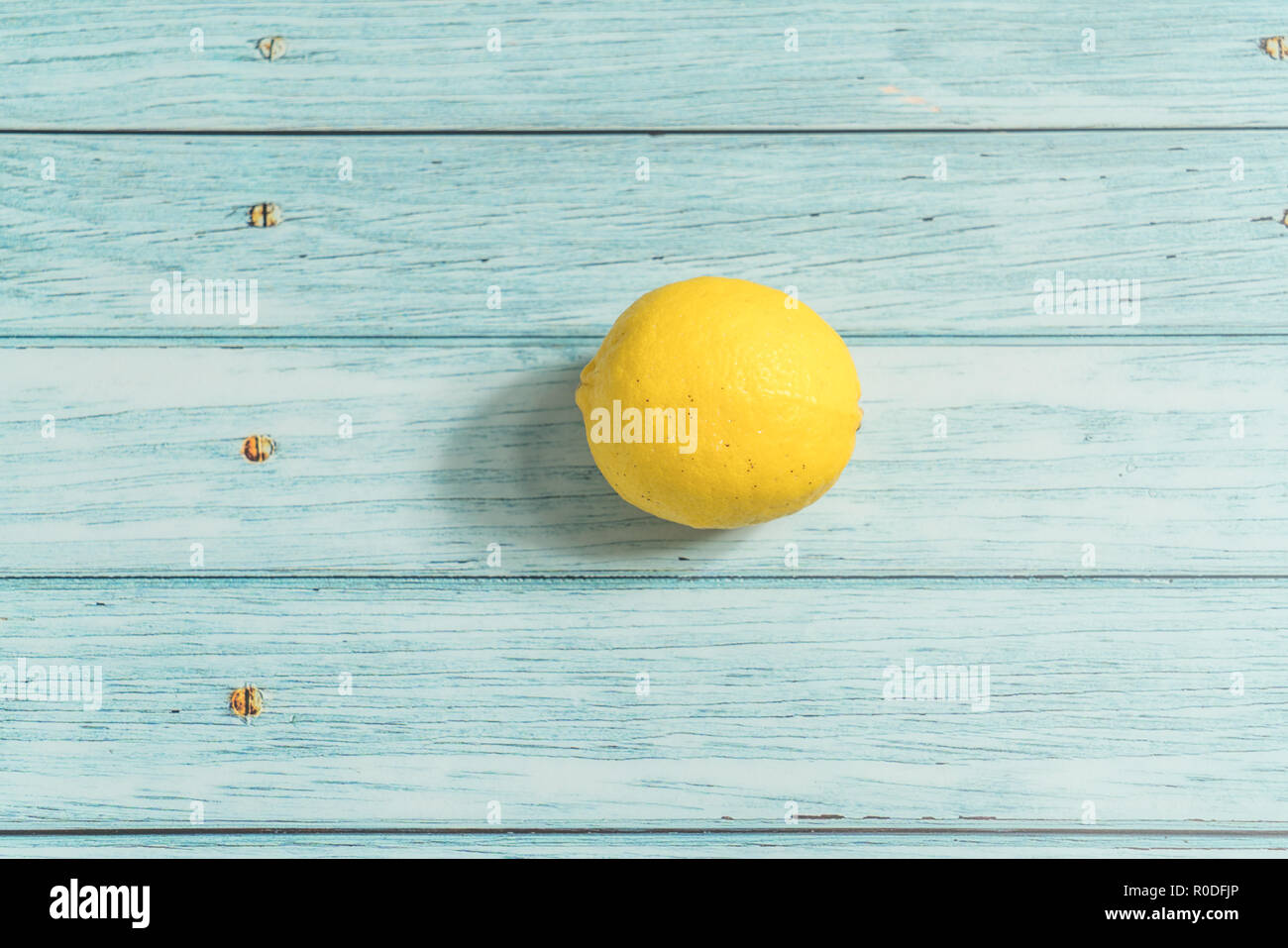 Lemon and cyan background Stock Photo