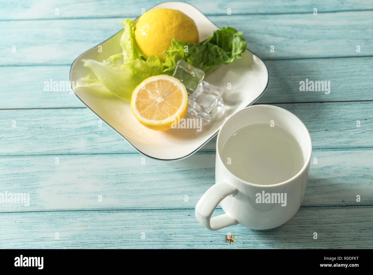 Lemon and cyan background Stock Photo