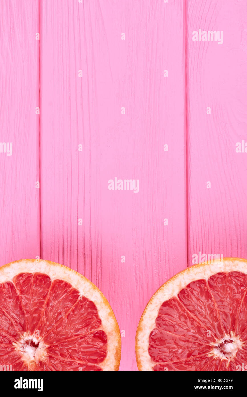 Cutted grapefruit with copy space on top. Stock Photo