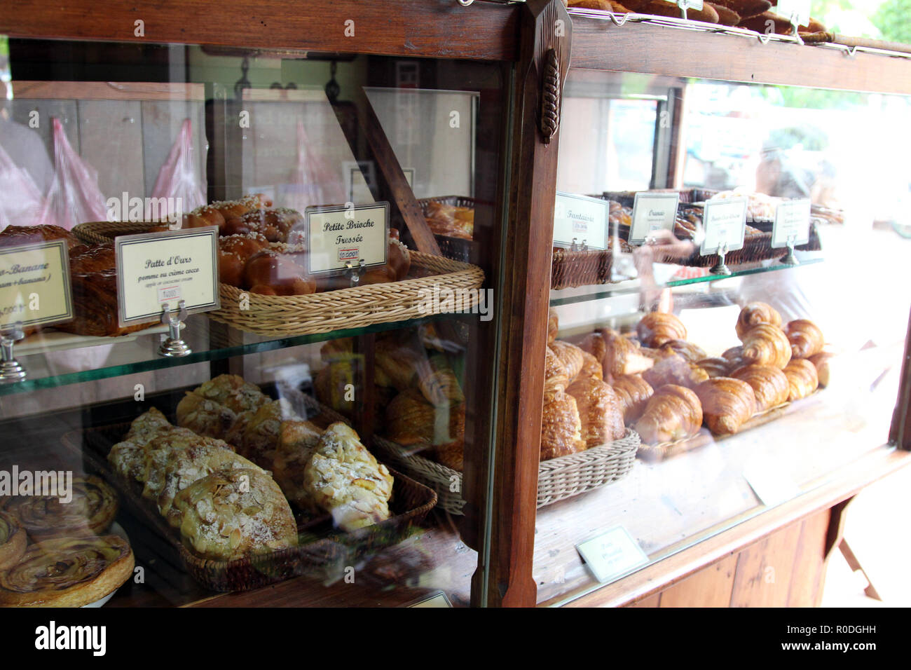 Tasty French baked goods on display at Le Banneton Cafe, Luang Prabang, Laos Stock Photo