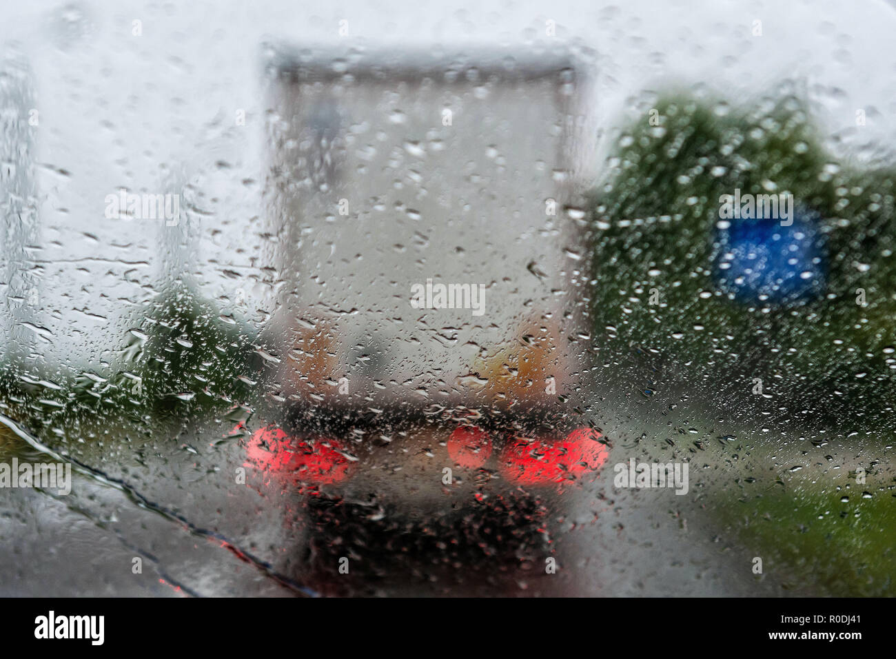 Abstract background - View through a rain drop on a truck. Stock Photo