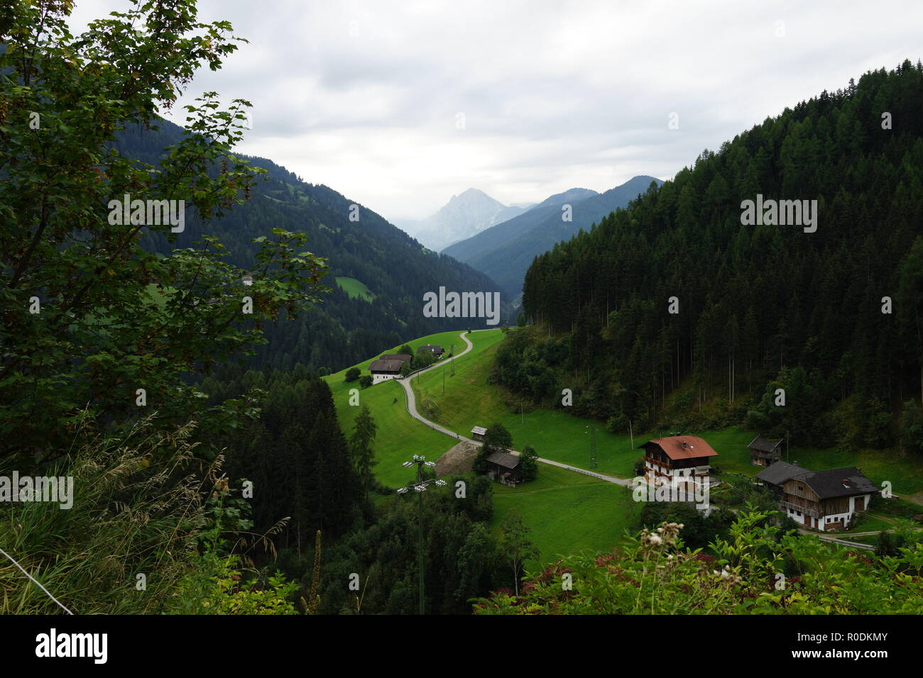 Alpine mountain landscape with typical houses Stock Photo