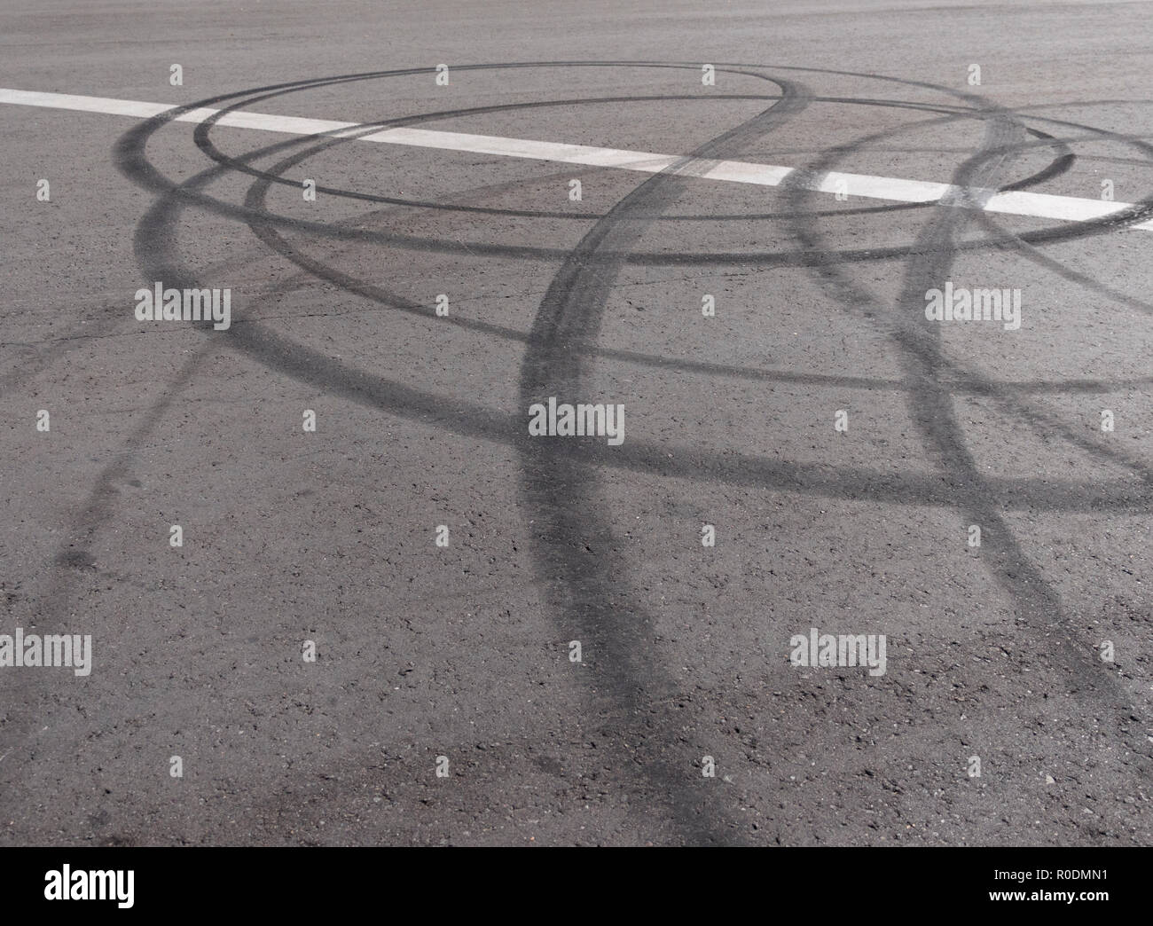 Black trail from rubber tires on the asphalt Stock Photo Alamy