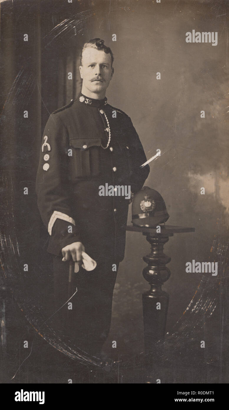 Vintage Ashton-under-Lyne Photographic Postcard of a British Police Constable. Collar No 35 Stock Photo