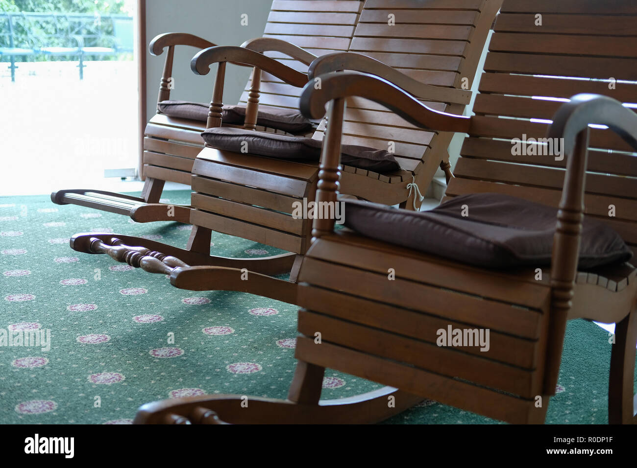 wooden rocking chair in living room Stock Photo Alamy