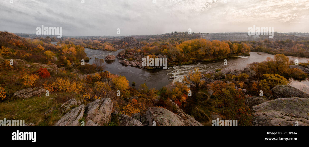 autumn yellow leaves panorama small river Southern Bug stones rocks Stock Photo