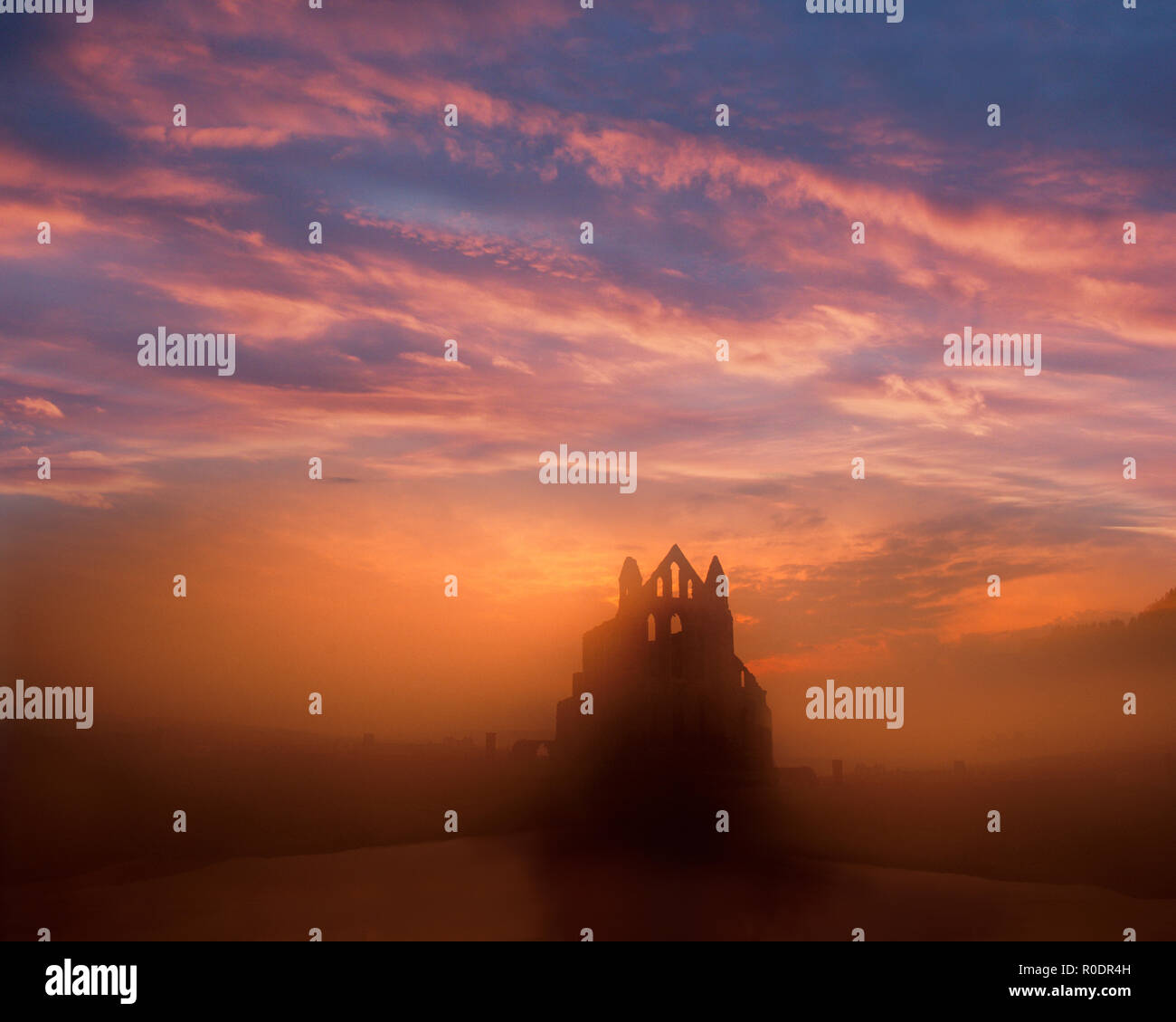 GB - NORTH YORKSHIRE: Sunet over Whitby Abbey Stock Photo